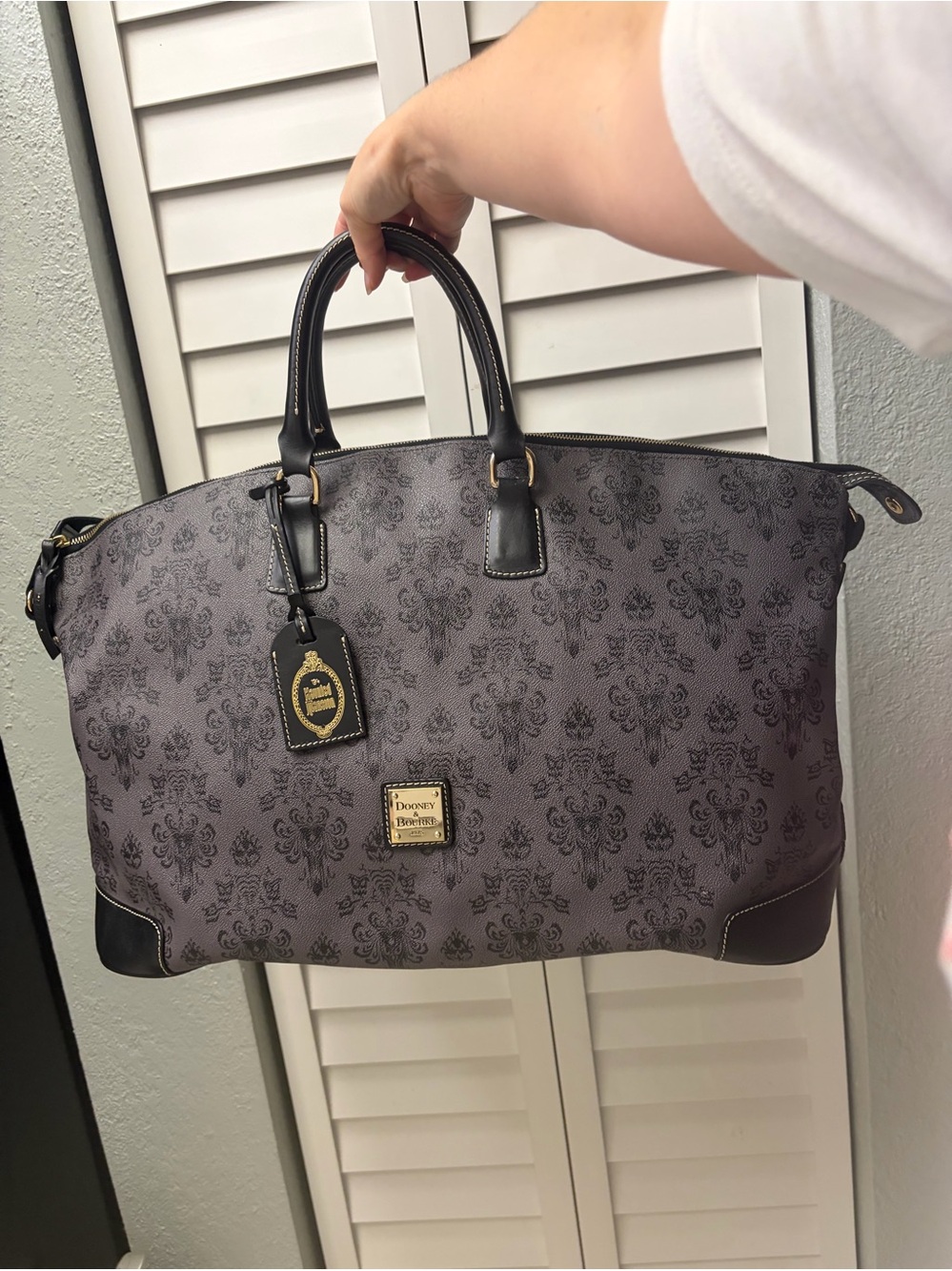 Dooney & Bourke x Disney hunted mansion duffle bag